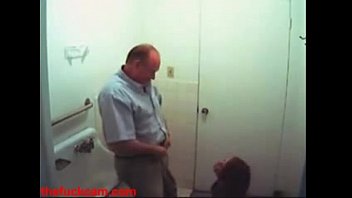 Live Sex - Girl gives a blowjob to a guy in a public bathroom caught on webcam