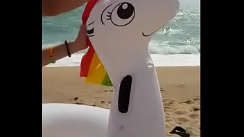Unicorn is hard a. and had an orgasm by his owner in the beach