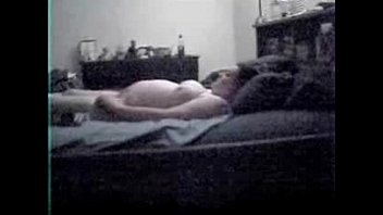 My pregnant mum masturbating on bed. Hidden cam