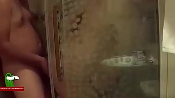 A fat girl and her boy fucking behind the shower screen. SAN219